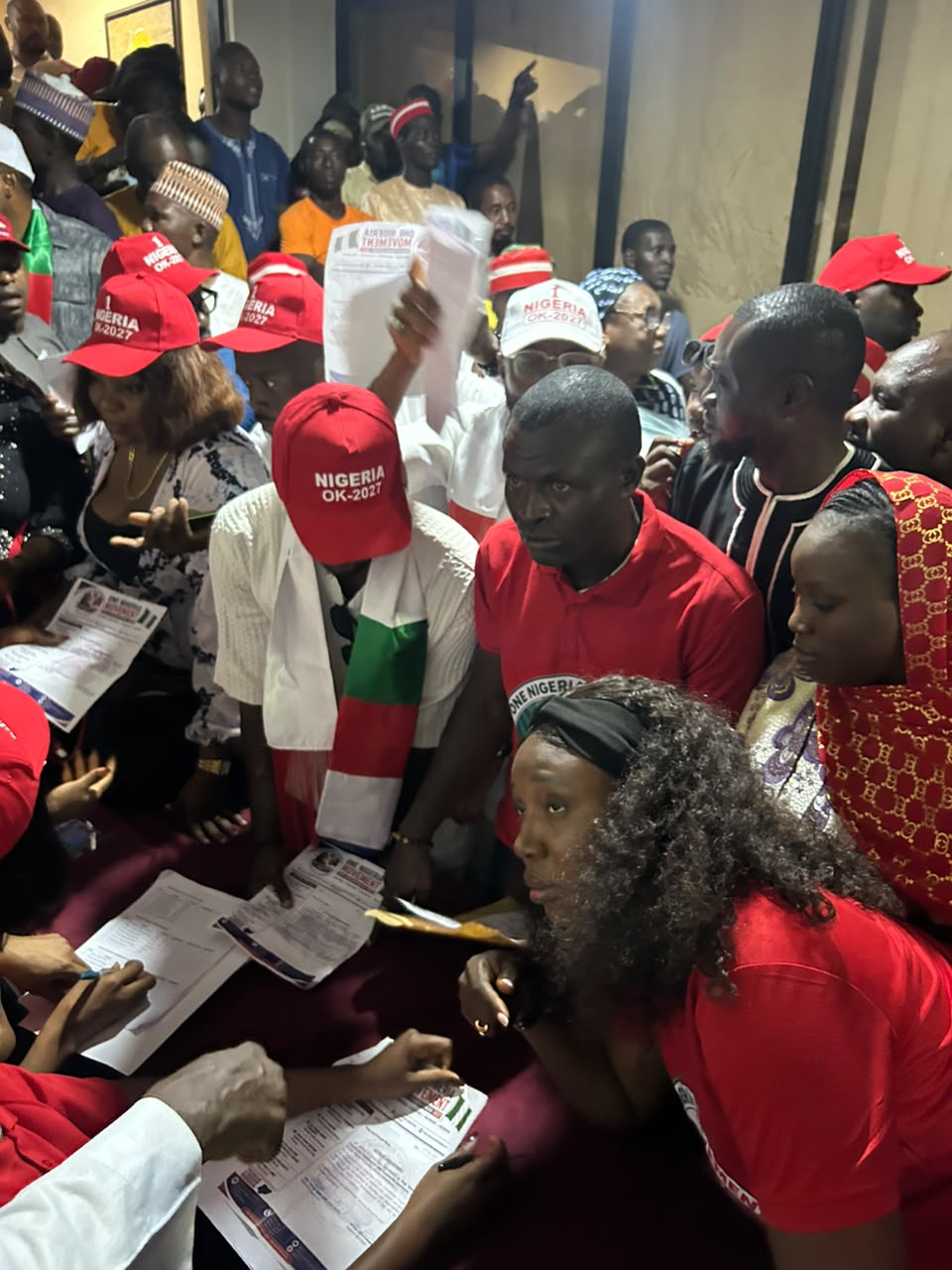 Members gathered around the inauguration registration desk